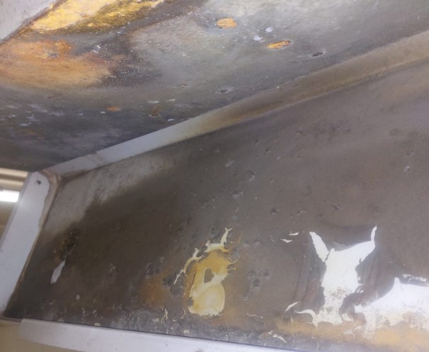 Dirty industrial evaporator needing cleaning
